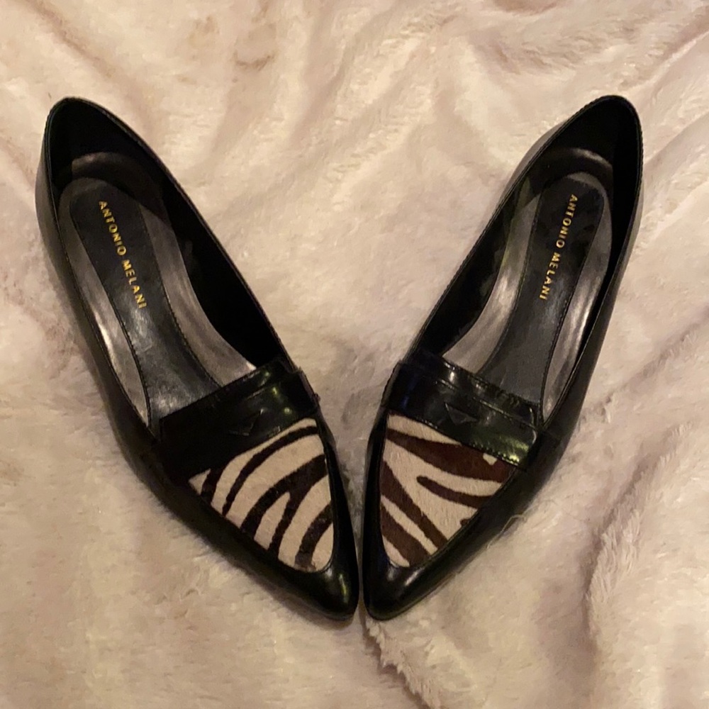 Antonio Melani kitty heels. Calf hair one brown and one black zebra print.